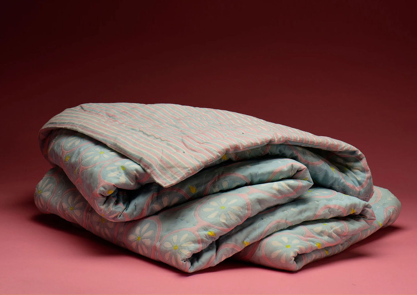 Brush Textiles | daisy chain/ baby blue reversible quilt
